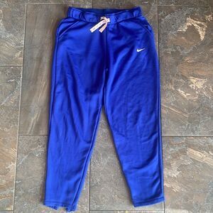 Nike Women's joggers with Pink drawstrings and zippers on the back/bottoms S- XS